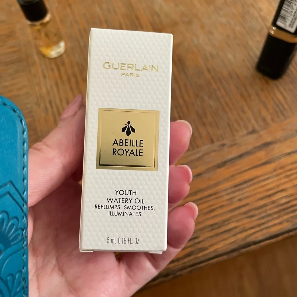 Lot of new Guerlain Youth Watery Oil & L’Oréal Julianne’s Red 401 lipstick